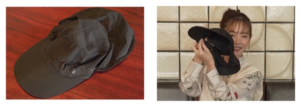 黒い帽子と帽子の説明をする女性